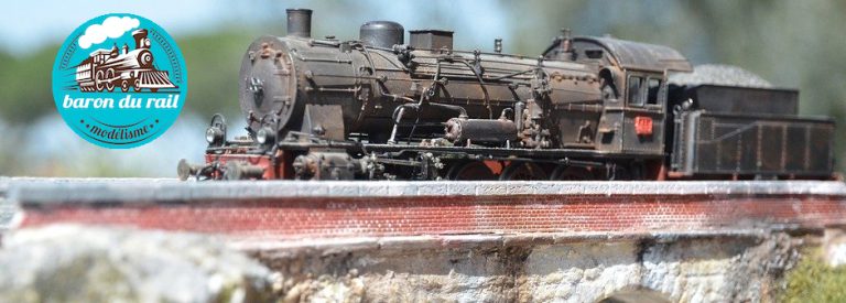 Maquette de train et logo de Baron du rail, magasin utilisant un bon logiciel de caisse pour magasin de modélisme.